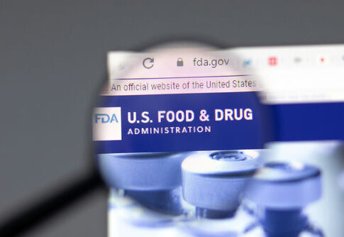 Magnifying glass focusing on the FDA website header